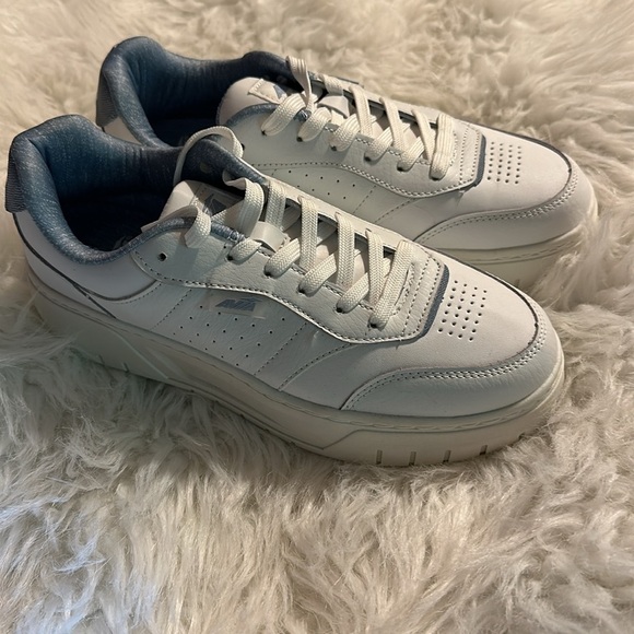 White leather never worn. Just tried on walked through house but were too big - Picture 3 of 6